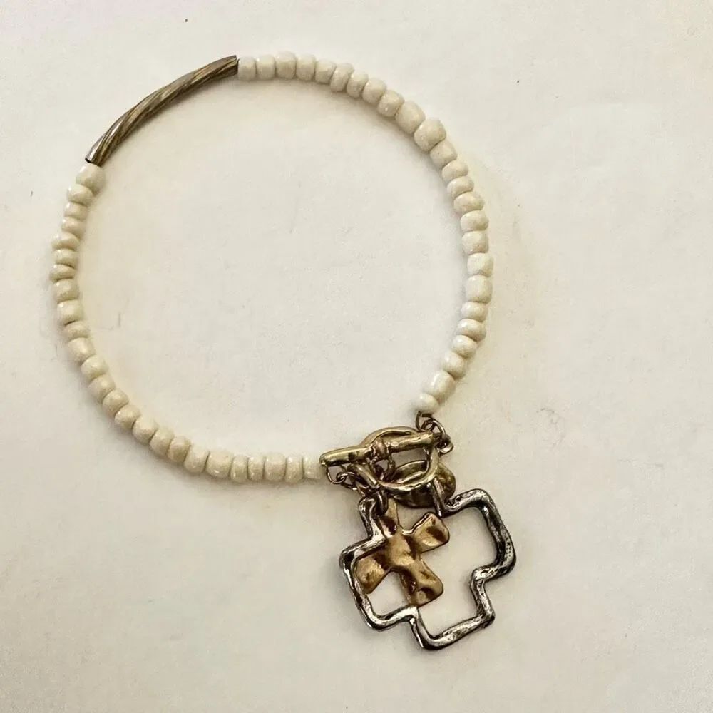 Envious cross charm bracelet
